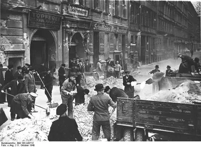 Berliners clearing the streets of rubble following an Allied air attack - October 1940