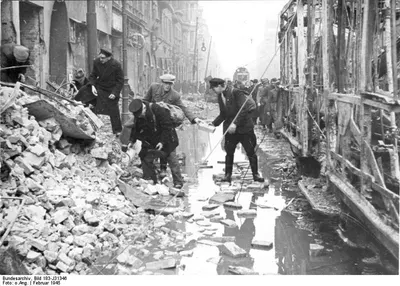 The streets of the city being cleared of debris from an Allied air attack before the Battle of Berlin - February 1945