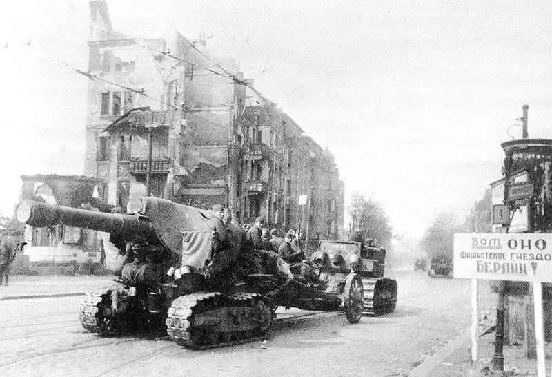 Bringing forward the heavy guns of Fifth Shock Army’s Breakthrough Artillery Division (sign on the right reads: "This is the fascist nest Berlin"