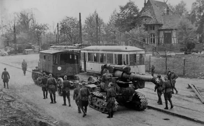 The Soviet artillery tractor Voroshilovets tows a 203-mm howitzer B-4 on the outskirts of Berlin