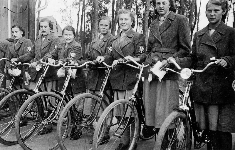 A section of the National Labour Service’s female branch (RADwJ) prepare to mount their bicycles and support their male defenders by delivering messages or other tasks